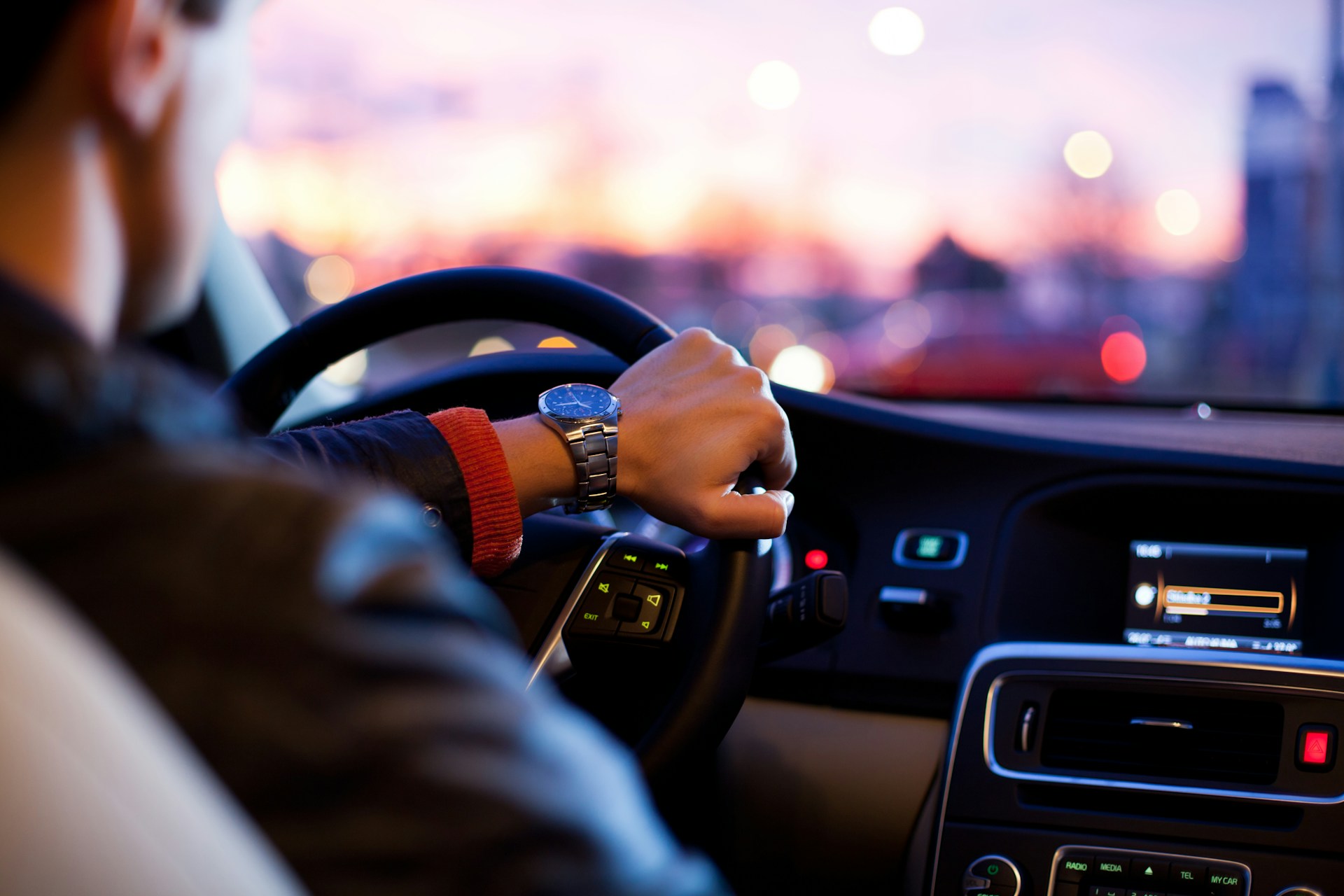 A view of a person driving a car